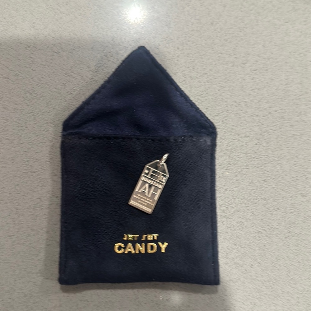 Jet Set Candy IAH silver luggage tag